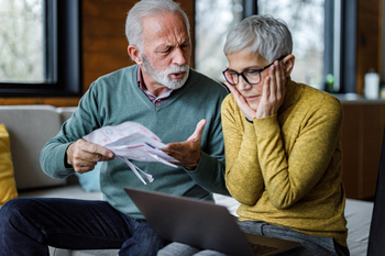 The Surprising Reason 50% of Parents Risk a Retirement Savings Shortfall: https://g.foolcdn.com/editorial/images/847815/senior-couple-upset-gettyimages-1409421120.jpg