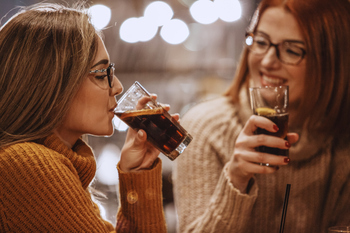 2 No-Brainer Dividend Stocks to Buy Right Now: https://g.foolcdn.com/editorial/images/848648/cola-drinker-women.jpg
