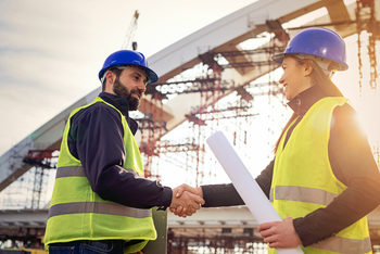 Why I'll Never Sell This Under-the-Radar Warren Buffett Stock: https://g.foolcdn.com/editorial/images/848204/people-shaking-hands-at-a-construction-site.jpg