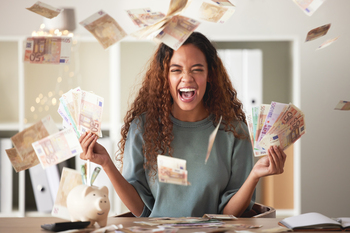 2 Growth Stocks to Buy and Hold Through 2035: https://g.foolcdn.com/editorial/images/843475/smiling-investor-throwing-money-in-the-air.jpg