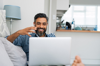 Should You Buy Nu Holdings (NU) Stock Before February?: https://g.foolcdn.com/editorial/images/848868/a-person-uses-a-laptop-at-home.jpg
