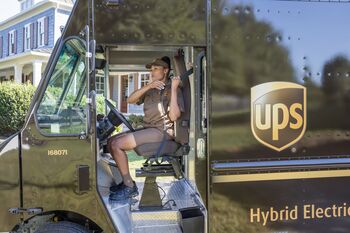 Should You Buy UPS Stock While It's Below $105?: https://g.foolcdn.com/editorial/images/848869/ups-driver-womanoriginal.jpg