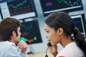 2 Surefire Chip Stocks to Buy and Hold for the Next Decade: https://g.foolcdn.com/editorial/images/840890/trader-stocks-investing-wall-street-profit-phone-broker.jpg