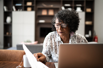 There's a Surprising Downside to the Change in Social Security Work Rules in 2026: https://g.foolcdn.com/editorial/images/847189/retiree-reviewing-finances.jpg