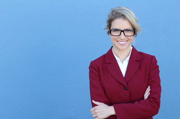 2 High-Yield Dividend Stocks You Can Buy and Hold for a Decade: https://g.foolcdn.com/editorial/images/838786/young-businesswoman-smiling-happy-proud-confident.jpg
