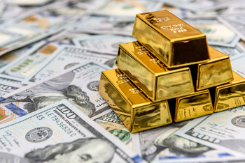 Why Newmont Stock Is Jumping Higher Today: https://g.foolcdn.com/editorial/images/849533/gold-bars-stacked-on-cash.jpg