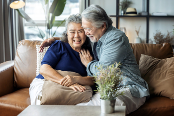 Is This One of the Best ETFs to Buy Right Now?: https://g.foolcdn.com/editorial/images/844535/getty-couple-cuddling-on-couch-happy-brown-sofa.jpg