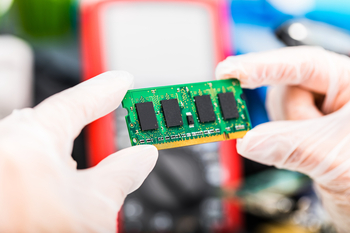 Why Western Digital Stock Popped Today: https://g.foolcdn.com/editorial/images/849697/gloved-hands-hold-a-dram-computer-memory-chip.jpg