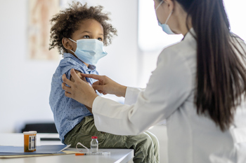 Why UnitedHealth Stock Bumped Higher Today: https://g.foolcdn.com/editorial/images/849791/child-receiving-a-vaccination-shot-from-a-healthcare-professional.jpg