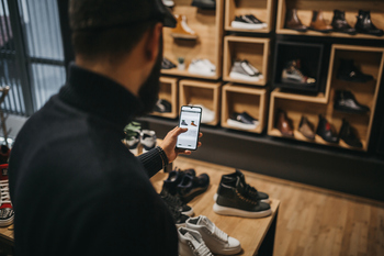 Apple's CEO Recently Invested in Nike. Should You Do the Same?: https://g.foolcdn.com/editorial/images/849356/shopper-comparing-prices-of-shoes-online.jpg