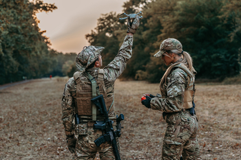 Why AeroVironment Stock Is Soaring Higher This Week: https://g.foolcdn.com/editorial/images/850153/soldier-in-camouflage-holds-up-a-small-drone.jpg
