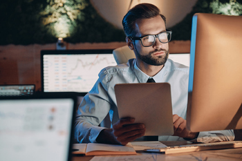 2 Stocks to Buy If the Market Crashes in 2026: https://g.foolcdn.com/editorial/images/849670/person-sitting-and-working-at-a-desk.jpg