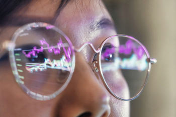 Why Wall Street Thinks Palantir Stock Will Stall in 2026 but That This AI Stock Will Soar 40%: https://g.foolcdn.com/editorial/images/850102/chinese-woman-eyeglasses-stock-charts.jpg