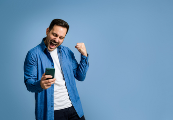 Got $500? 2 Cryptocurrencies to Buy and Hold for Decades: https://g.foolcdn.com/editorial/images/850156/fist-pump-smartphone.jpg