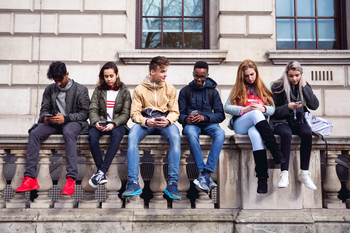 This Bank Stock Could Be One of the Best Companies to Own in 2026: https://g.foolcdn.com/editorial/images/849402/students-looking-at-their-phones.jpg