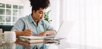 3 Magnificent Vanguard ETFs I'm Buying in 2026 and Never Selling: https://g.foolcdn.com/editorial/images/850069/person-sitting-at-a-desk-using-a-laptop-writing-in-a-notebook.jpg