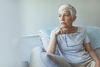 Bored in Retirement? 5 Things to Do.: https://g.foolcdn.com/editorial/images/850430/senior-woman-worried-holding-eyeglasses-gettyimages-1162818693.jpg