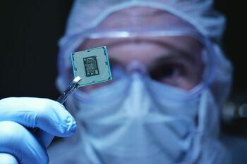 Nvidia Looks to Ramp Up Production of the H200 Chip. Here's Why That Might Not Necessarily Send the Stock Soaring.: https://g.foolcdn.com/editorial/images/850638/a-person-holding-up-an-artificial-intelligence-chip.jpg