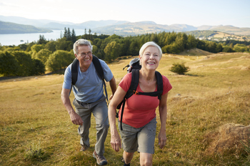 Applying for Spousal Social Security Benefits in 2026? Here's What You Need to Know.: https://g.foolcdn.com/editorial/images/850773/active-couple-outdoors-hiking-health-fitness.jpg