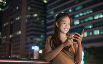 Should You Buy Verizon Communications Stock Before Jan. 30?: https://g.foolcdn.com/editorial/images/850637/a-person-using-their-phone-outside.jpg