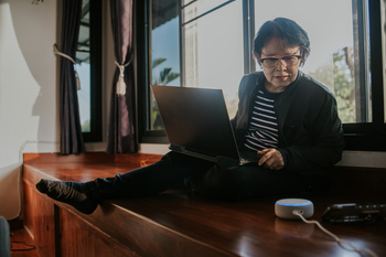 2 Things Could Happen to Your Social Security if You Keep Working After Retirement: https://g.foolcdn.com/editorial/images/849381/working-and-typing.jpg