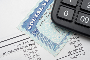 3 Reasons Your January Social Security Payment Looks So Different: https://g.foolcdn.com/editorial/images/851564/getty-images-social-security-calculator-card-statement.jpeg