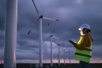 The Hidden Gem Energy Stock That Could Own the Next 10 Years: https://g.foolcdn.com/editorial/images/849010/a-person-holding-a-tablet-looking-at-wind-turbines.jpg