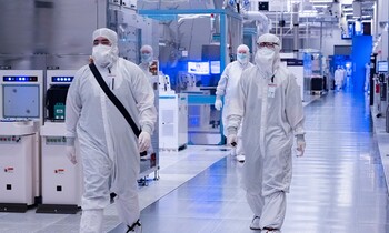 The Clue Hiding in Intel's Ohio Construction Site That Investors Shouldn't Ignore: https://g.foolcdn.com/editorial/images/851981/inside-intel-factory-two-people-in-lab-gear-walking_intel-2.jpg