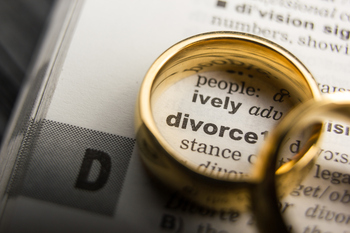 2 Ways Your Ex Could Wind Up With Your 401(k) -- and How to Prevent It: https://g.foolcdn.com/editorial/images/851684/divorce-dictionary-wedding-rings.jpg