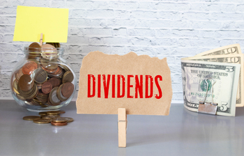 3 Dividend Stocks to Hold for the Next 25 Years: https://g.foolcdn.com/editorial/images/851771/dividends-sign-displayed-besides-cash.jpg