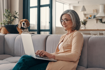 All Medicare Advantage Enrollees Should Do This By March 31: https://g.foolcdn.com/editorial/images/851828/older-woman-laptop-dog-in-background-gettyimages-1307241175.jpg