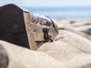 2 Cheap Tech Stocks to Buy Right Now: https://g.foolcdn.com/editorial/images/852080/locked-treasure-chest-in-the-sand.jpg