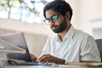 Switching Jobs in 2026? 2 Things Not to Do With Your 401(k).: https://g.foolcdn.com/editorial/images/851830/man-20s-laptop-serious-gettyimages-1416817899.jpg