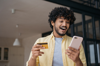 The Ultimate Growth Stock to Buy With $1,000 Right Now: https://g.foolcdn.com/editorial/images/849459/person-with-credit-card-and-mobile-phone.jpg