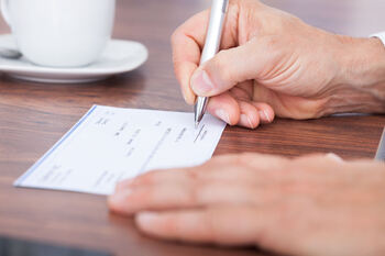 Here's Exactly How I Plan to Spend My Social Security Checks in Retirement: https://g.foolcdn.com/editorial/images/852102/writing-a-check.jpg