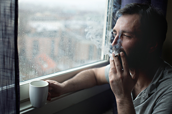 Altria Group: Is This High-Yield Dividend Stock Too Cheap to Ignore?​: https://g.foolcdn.com/editorial/images/850331/smoker-looks-out-the-window.jpg
