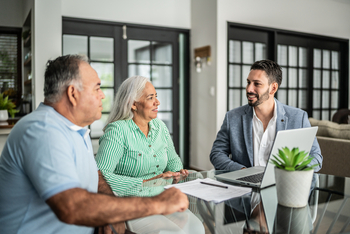 Here's How to Do a 401(k) Rollover Right, According to a Financial Planner: https://g.foolcdn.com/editorial/images/852070/couple-meeting-with-financial-advisor.jpg