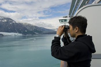 Royal Caribbean: Cruise Stock to Buy and Hold or Just a Cyclical Trade?​: https://g.foolcdn.com/editorial/images/850335/cruise-passenger-views-coast-through-binoculars.jpg