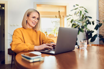 IRAs and 401(k)s Are Great. Here's Why They Aren't Enough for Your Retirement.: https://g.foolcdn.com/editorial/images/852119/woman-30s-40s-laptop_gettyimages-1395474771.jpg