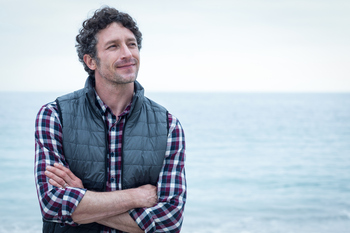Planning for Retirement? Here's Why Your Savings Matter More Than Your Net Worth.: https://g.foolcdn.com/editorial/images/852114/man-40s-in-front-of-water-gettyimages-673936398.jpg