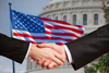 Why USA Rare Earth Stock Is Soaring Today: https://g.foolcdn.com/editorial/images/852946/handshake-in-front-of-american-flag-and-capitol-building.jpg