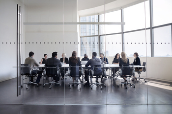 Why The Trade Desk Stock Is Plummeting Today: https://g.foolcdn.com/editorial/images/853020/professionally-dressed-executives-having-a-meeting-around-a-table-in-a-glass-walled-conference-room.jpg