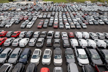 Ford's and GM's Largest Threat Could Set Up Shop Next Door: https://g.foolcdn.com/editorial/images/852518/gettyimages-1472673456.jpg