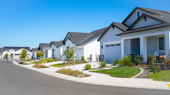 This Unstoppable Stock Soared by 264% in 2025. Here's What Could Happen in 2026.: https://g.foolcdn.com/editorial/images/852822/a-row-of-houses-on-a-quiet-residential-street-on-a-clear-sunny-day.jpg