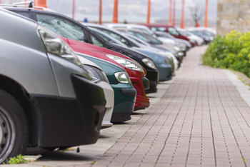 Where Will Lucid Be in 1 Year?: https://g.foolcdn.com/editorial/images/852710/23_08_30-a-row-of-parked-cars-_mf-dload.jpg
