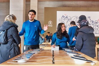 Should You Buy Apple Stock Before Jan. 29?: https://g.foolcdn.com/editorial/images/852856/apple-sainte-catherine-montreal-canada-opening-day-team-members-assisting-customers.jpg