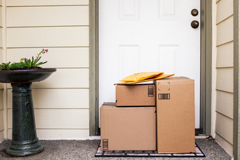 Why UPS Stock Crept Higher on Tuesday: https://g.foolcdn.com/editorial/images/853263/packages-on-a-front-porch.jpg