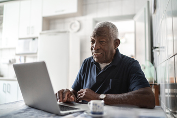 3 Retirement Investments That Could Beat Inflation: https://g.foolcdn.com/editorial/images/852873/senior-man-laptop-gettyimages-1219569802.jpg