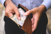 2 Bank Stocks That Could Soar in 2026: https://g.foolcdn.com/editorial/images/853405/cash-in-wallet-2023.jpg