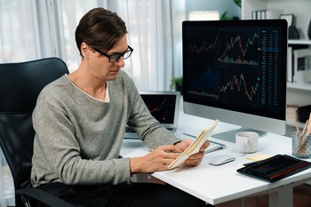 Why Palantir Technologies Stock Slumped Today: https://g.foolcdn.com/editorial/images/853616/a-person-reviewing-notes-on-a-pad-with-graphs-on-a-computer-monitor-in-the-background.jpg